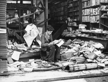 Literature: A boy  amid the ruins of a London bookshop following an air raid on London in WW II. Photo: AP Photo