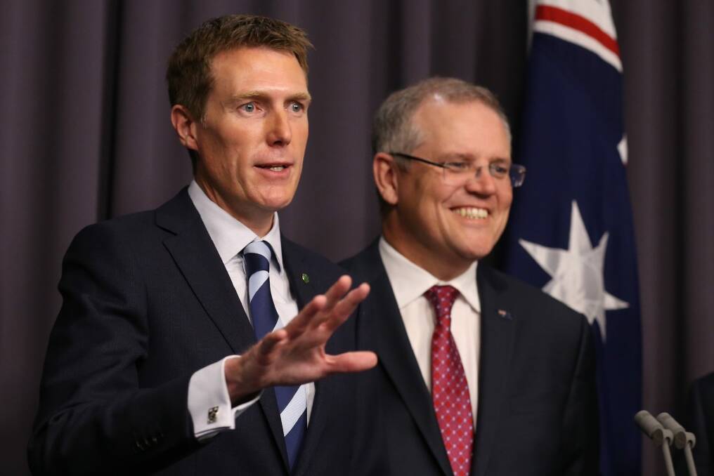 Christian Porter and Federal Treasurer Scott Morrison. Mr Porter has been accused of failing to fight for a fairer GST deal.  Photo: Andrew Meares