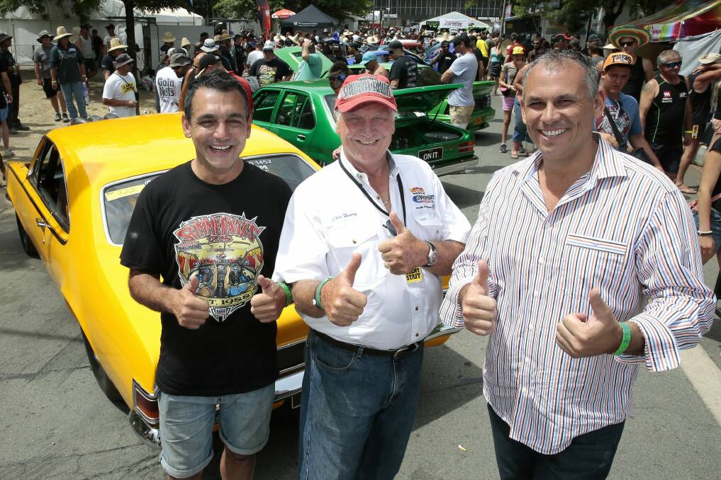 Summernats co-owner Andy Lopez, left, event founder Chic Henry and Northern Territory Chief Minister Adam Giles among the crowd at Exhibition Park on Sunday. Photo: Jeffrey Chan