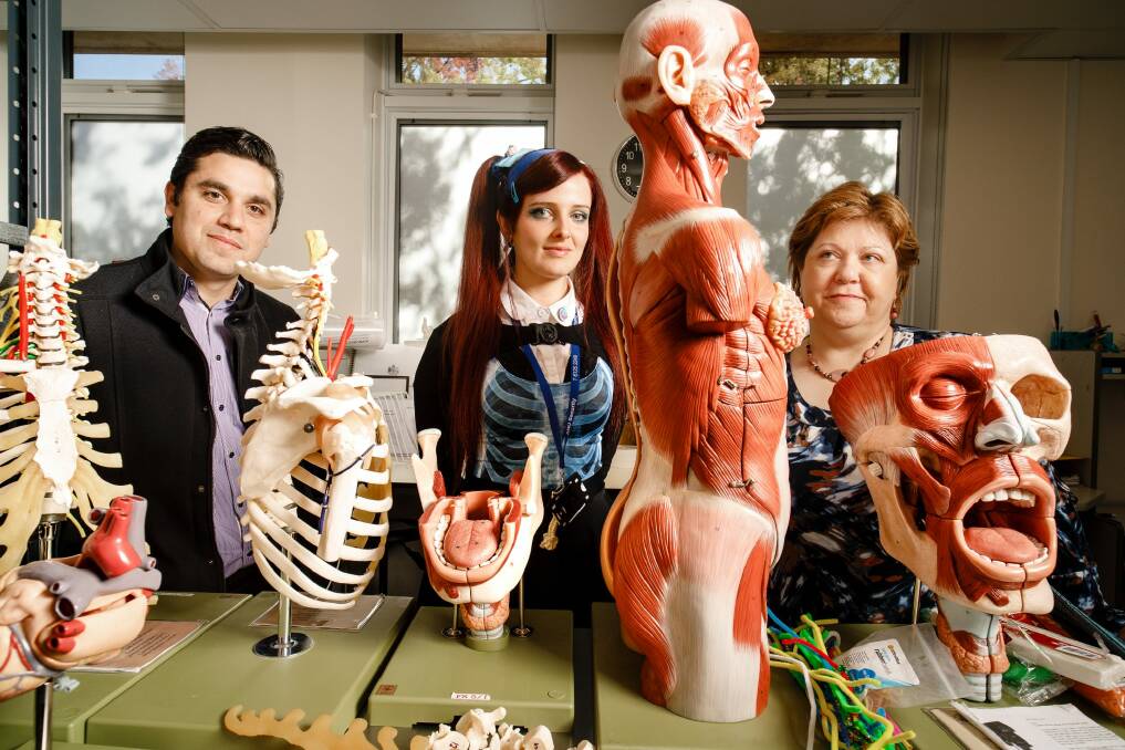 ANU Body Donation program coordinator Dr Riccardo Natoli, Anatomical services specialist Hannah Lewis, and Associate Professor of Anatomy Krisztina Valter.  Photo: Sitthixay Ditthavong