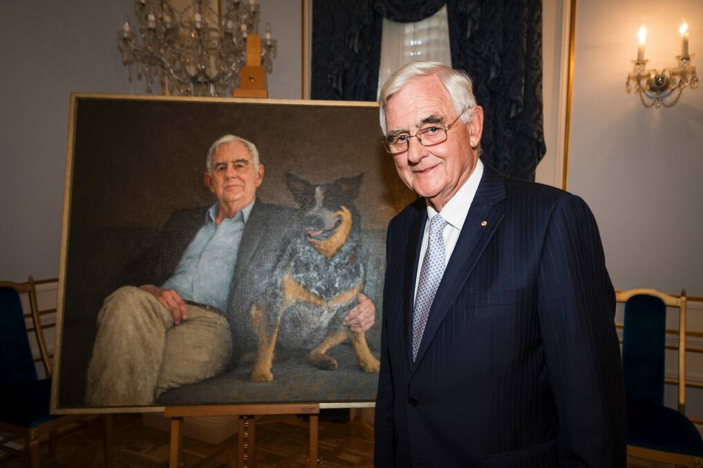 Terry Snow with his portrait. Photo: Dion Georgopoulos