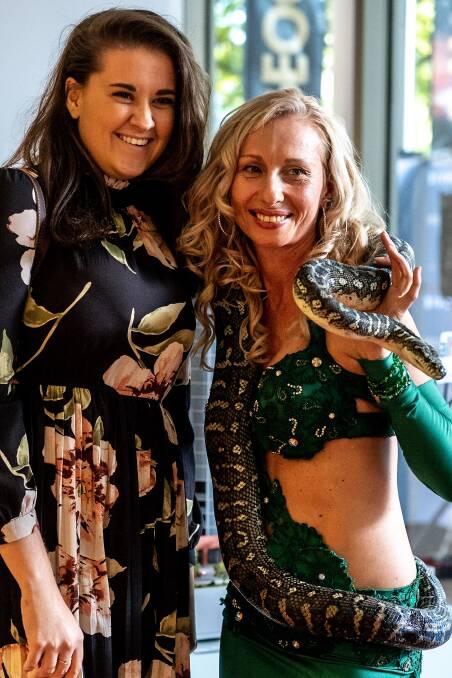 A guest at the Envie launch which featured live snakes. Photo: Supplied