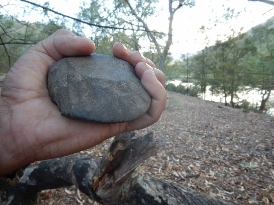 One of thousands of stone tools scattered around ancient campsites on the banks of the Snowy.  Photo: Tim the Yowie Man