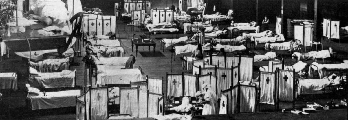 The 1918 Spanish Flu pandemic killed millions of people worldwide. Here,  patients lie quarantined at the Melbourne Exhibition Buildings. Photo: State Library of Victoria