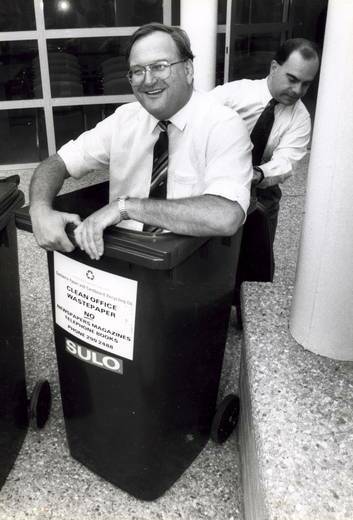 Tony De Domenico, right, manoeuvres Bill Stefaniak around in a wheelie bin in a proposal put forward by the Liberals in the ACT Assembly election of 1992.