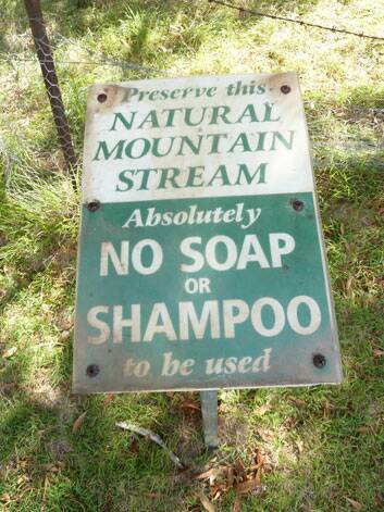 Warning sign to campers at Micalong Creek Photo: Supplied by Tim the Yowie Man