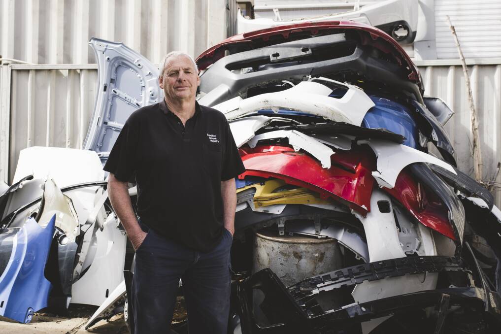Owner of Braddon Smash Repairs, Jeff Badcoe, has a massive backlog in jobs partly due to the number of animal collisions. Photo: Jamila Toderas