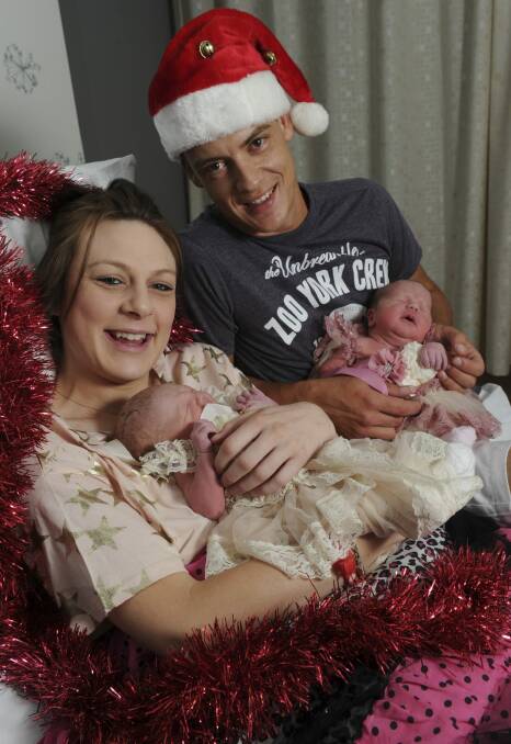 Tuggeranong couple Melissa Harrison and Dane Muench had double the reason to celebrate on Christmas Day when they welcomed twin daughters into the world.  Photo: Graham Tidy