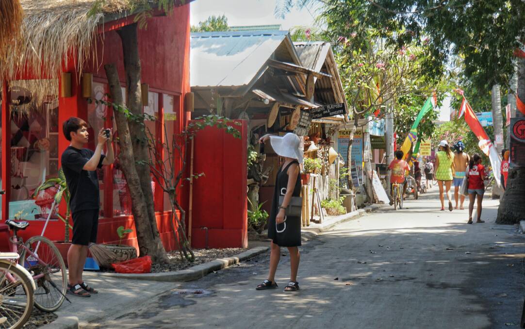 A usually busy street on Gili Air, one of the three tiny Gili islands to the north of Lombok. Photo: Amilia Rosa