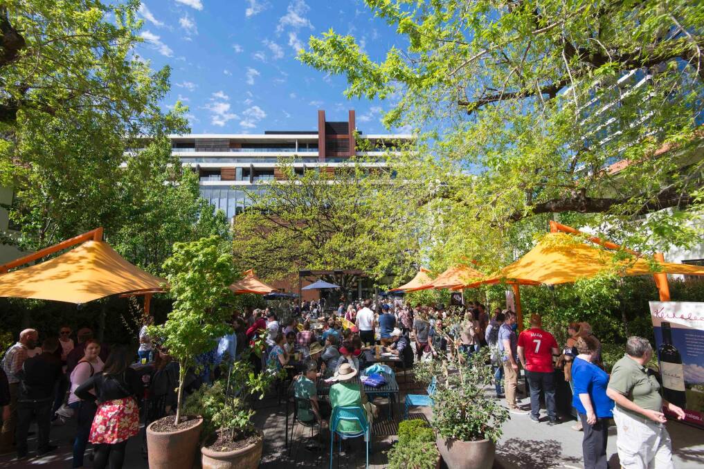 The Canberra District Wine Tasting will take over the New Acton courtyard on Sunday. Photo: Supplied