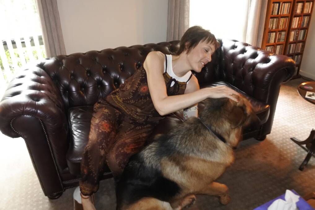 Gungahlin woman Tanya Gendle at home with her dog Atlas. Photo: Megan Doherty