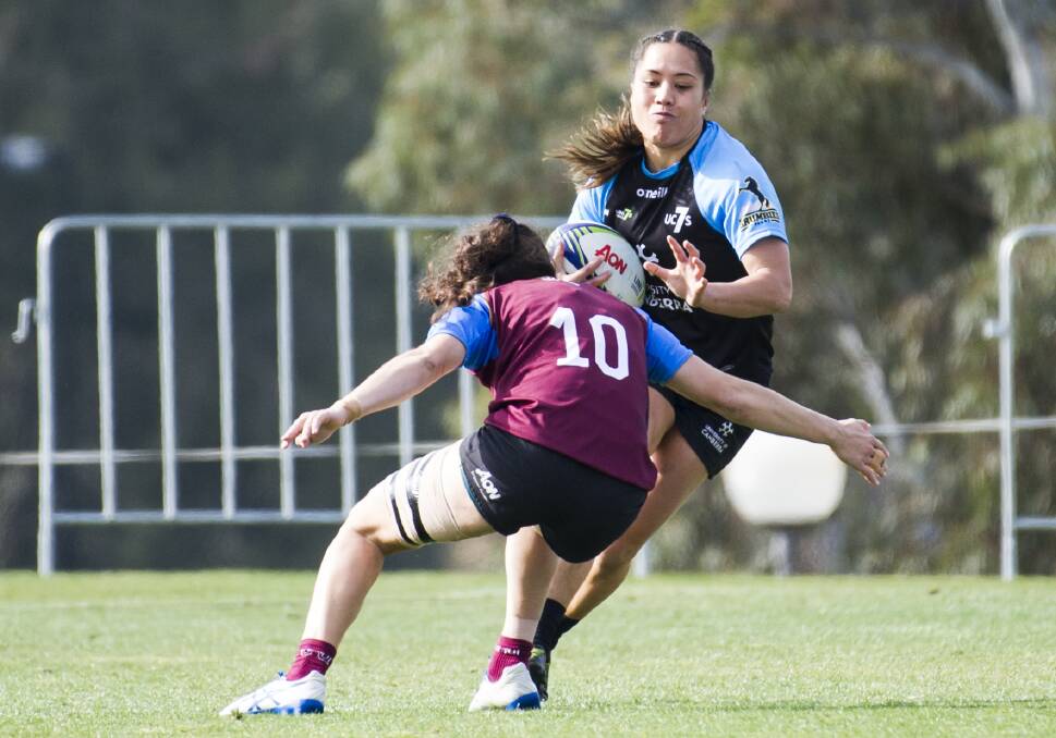 UC's Yasmin Meakes clatters into the defence. Photo: Elesa Kurtz