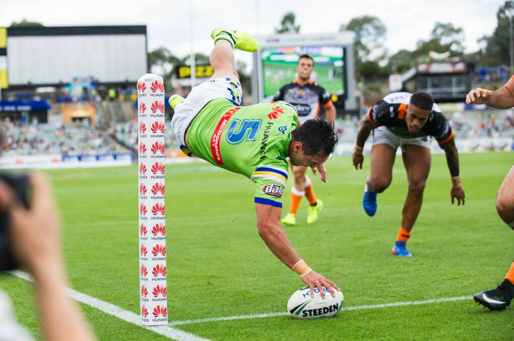 Acrobatic: Josh Rapana launches himself for the try line. Photo: Rohan Thomson