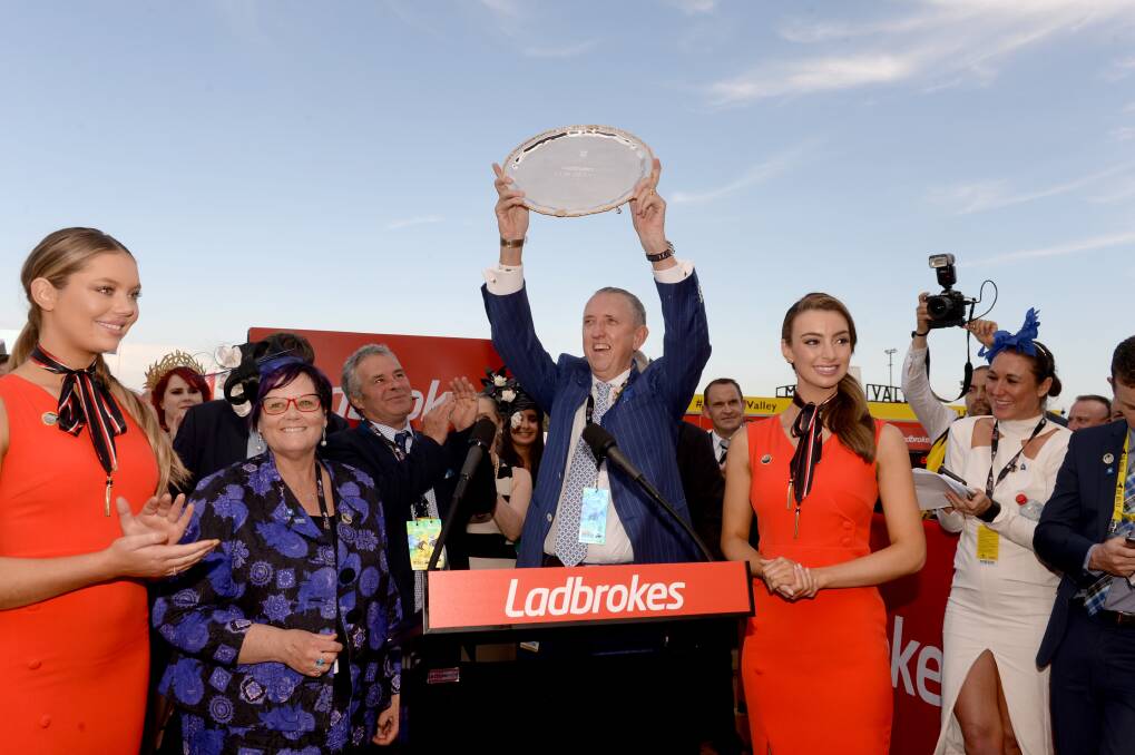 Winx owners Debbie Kepitis and Peter Tighe celebrate after winning the Cox Plate for the third time. Photo: AAP