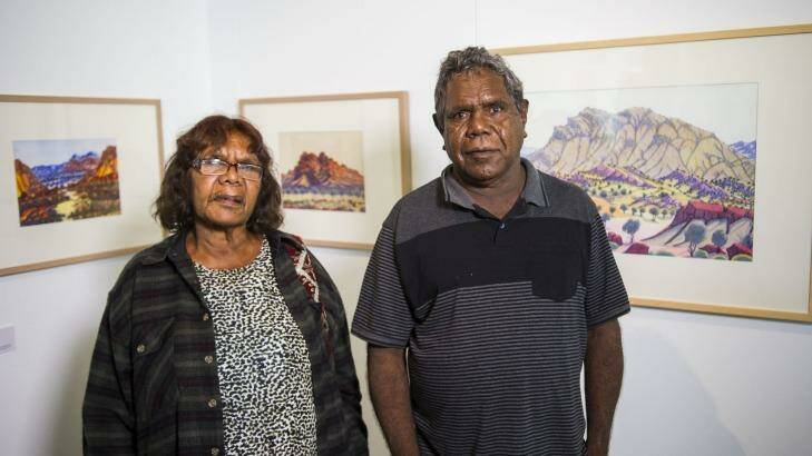Lenie and Kevin Namatjira with part of the Namatjira to Now exhibtion at Parliament House. Photo: Rohan Thomson