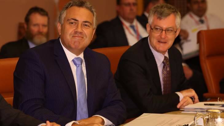 Treasurer Joe Hockey with Treasury secretary Martin Parkinson met state treasurers to discuss GST and infrastructure issues. Photo: Andrew Meares