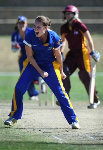 Meteors bowler Rene Farrell celebrates taking a wicket. Photo: Graham Tidy