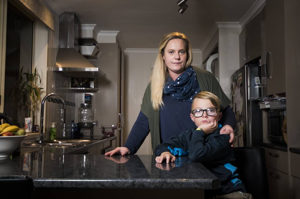 Renee Creech with her son Cody, 9, who was eating two-minute noodles when he accidentally burnt 15 per cent of his body.  Photo: Elesa Kurtz