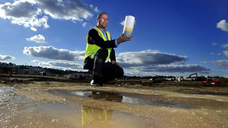 Mark Attiwill holds a micro filtration membrane at  Googong, where a $90 million water recycling project is planned. Photo: Melissa Adams