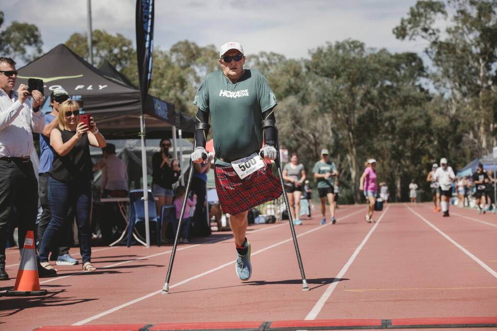Former Winter Paralympian Michael Milton succesfully breaks the 5km record for someone on crutches. Photo: Jamila Toderas