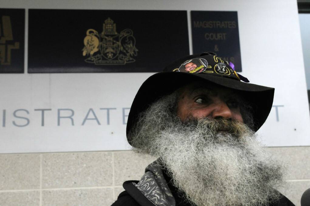 Adrian Charles Davis, 63, speaks outside the ACT Magistrates Court on Monday. Photo: Alexandra Back