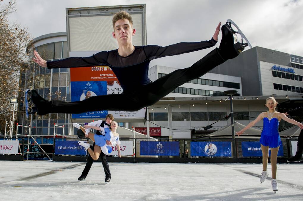 Alex and Christopher Fladun Dorling (background, left), Ben Meeuwissen (leaping) and Anastasia Bradshaw test out the ice rink in Civic. Photo: Jay Cronan