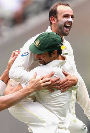 Nathan Lyon and Mitch Johnson celebrate the wicket of Ian Bell. Photo: Getty Images
