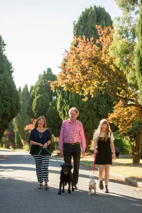 In her beloved inner-north, Alex Sloan loves walking with husband  Rob Thorman, their daugher Zoe Thorman and dogs Josie and Sophie. Photo: Jay Cronan