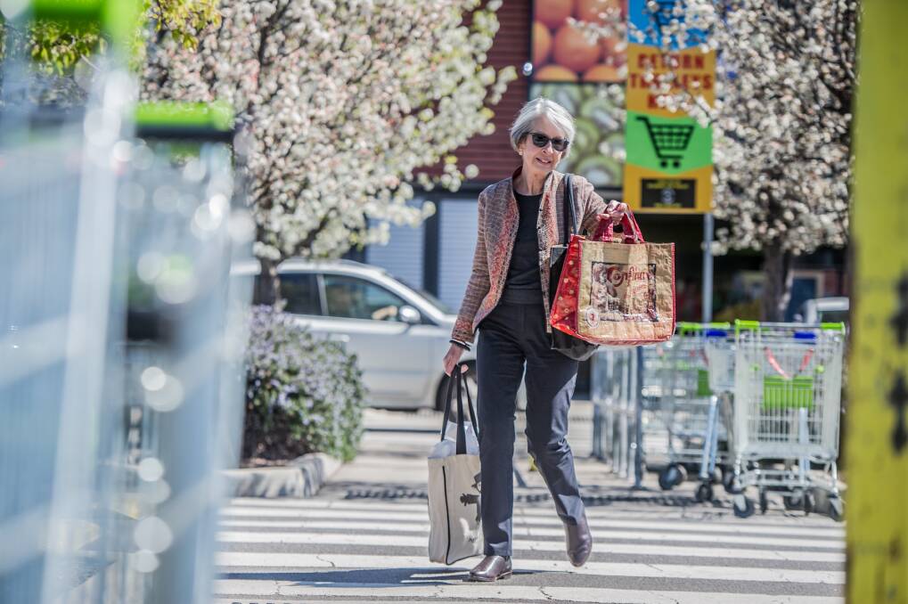 Avid reusable bag user Judy McMillan, seen shopping at the Fyshwick markets, has never found it hard to refuse the offer of plastic bags at the checkout Photo: Karleen Minney