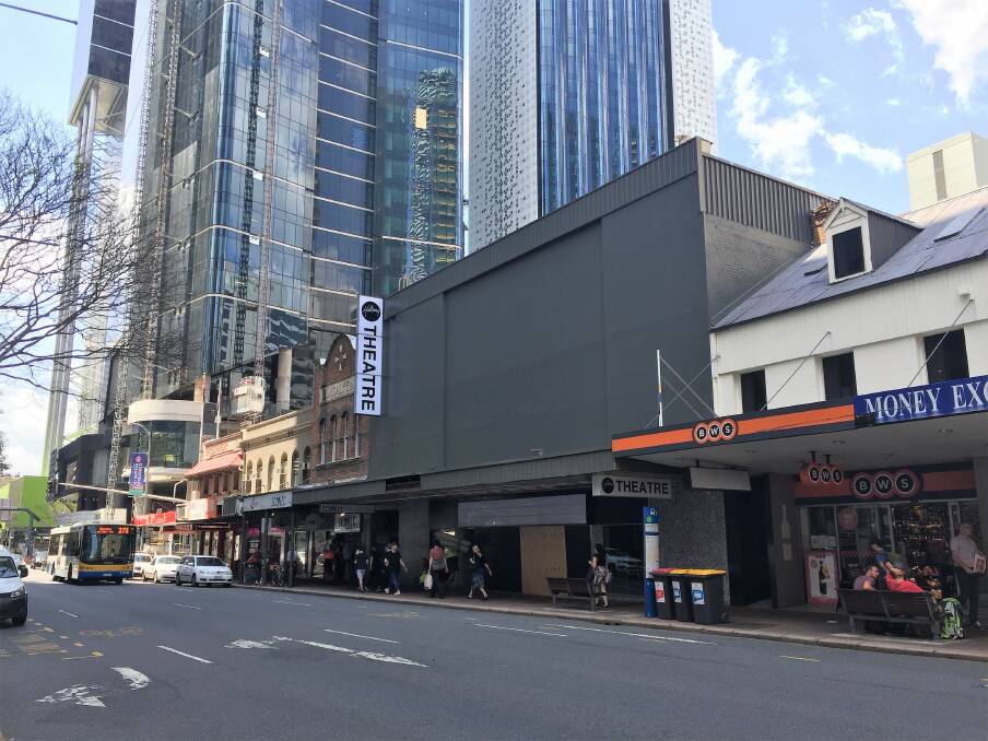 Hillsong has taken over Brisbane's old Tribal Theatre, painting the bright red exterior black. Photo: Lucy Stone/Fairfax Media