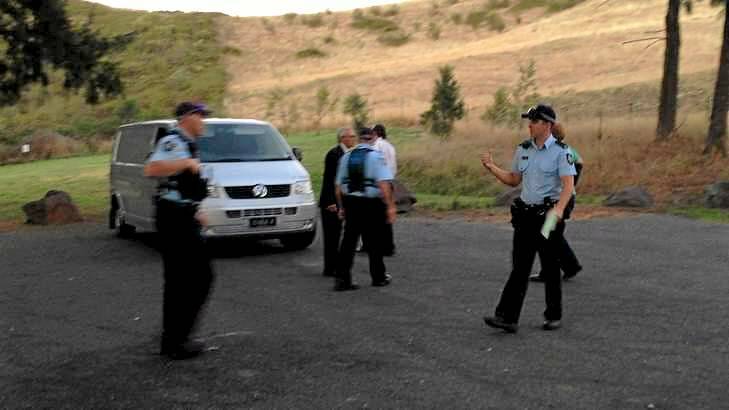 Police attend the drowning at Uriarra Crossing.