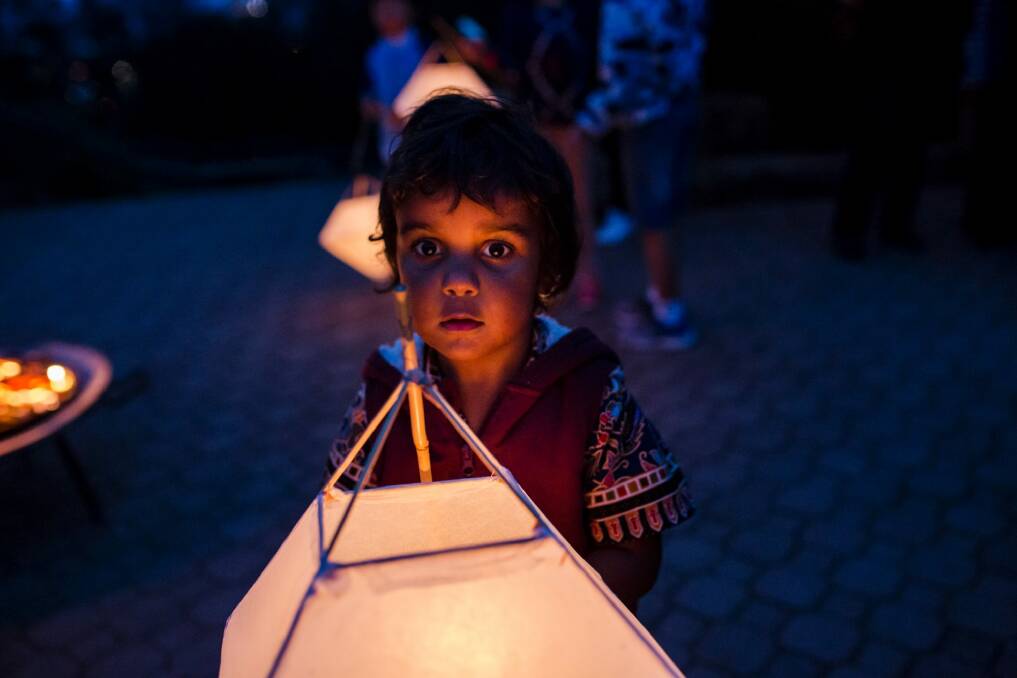 3-year-old Marandu Neale of Watson at the Anzac eve peace vigil. Photo: Jamila Toderas