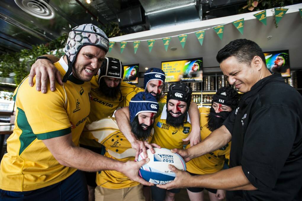 Former Wallaby Ben Alexander with The Dock staff dressed as Wallaby Scott Fardy up against chef Jon ''Kiwi Jon'' Turner in the lead-up to the Rugby World Cup final on November 1. Photo: Elesa Kurtz