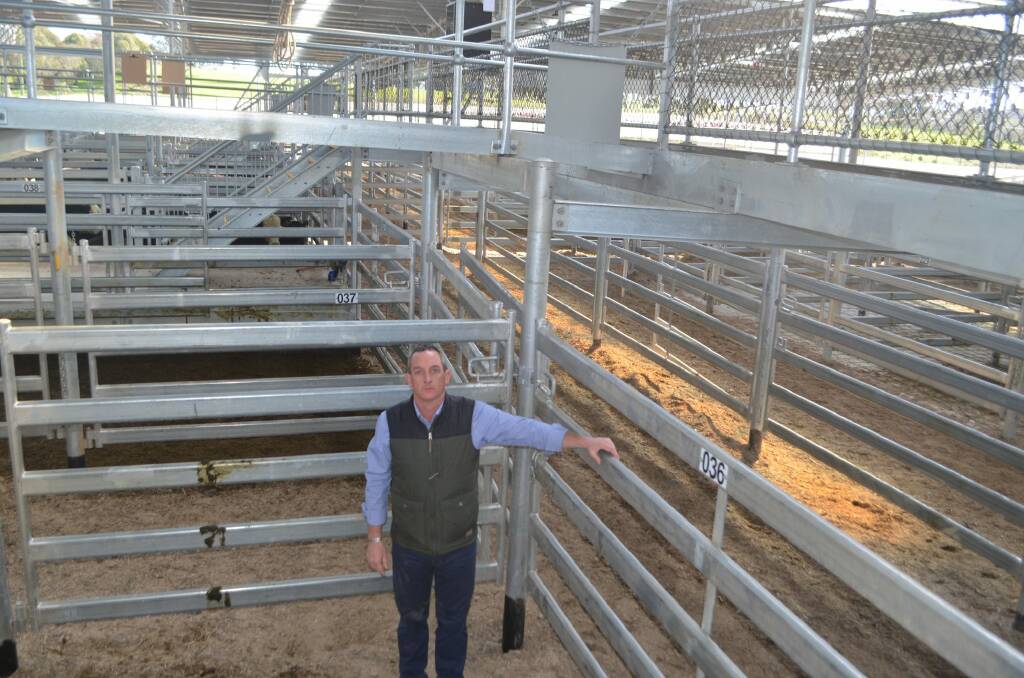 Rohan Arnold, 43, standing in a cattle pen at Yass.  Photo: THE LAND