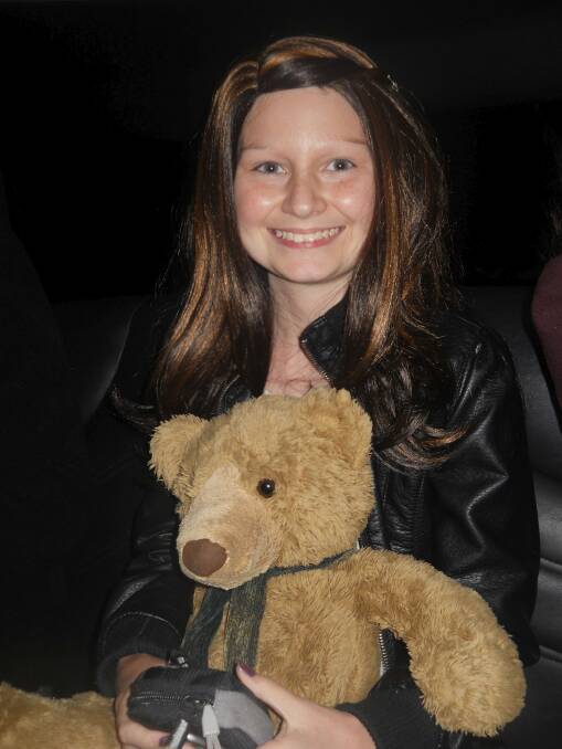 Dainere with her teddy bear Theodore. Photo: Supplied