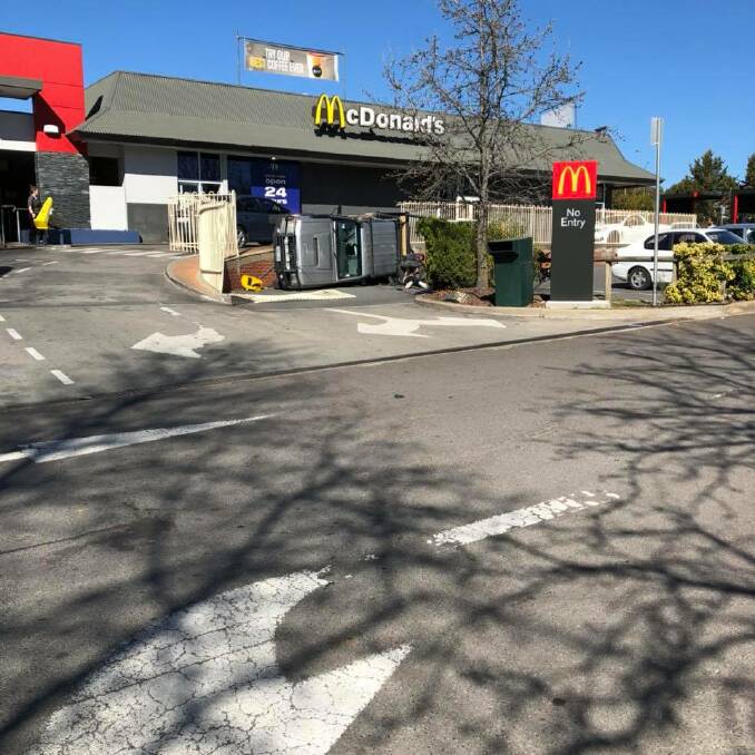 A car has rolled over at Belconnen McDonald's. Photo: Supplied