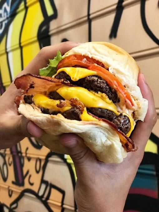 Oscy's Burgers has opened in Gungahlin with burgers, hot dogs and wings.  Photo: Facebook