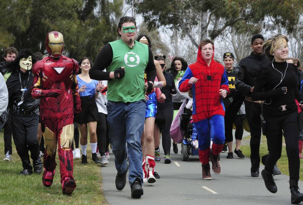 GangGang. Students and staff of Gungahlin College in Tuesday's fun run. Photo: Graham Tidy 