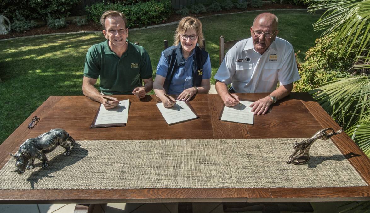 Signing the memorandum, (from left) Mandai Park Holdings Group CEO Mike Barclay, Wellington Zoo Trust CEO Karen Fifield and National Zoo &amp; Aquarium director Richard Tindale Photo: Karleen Minney