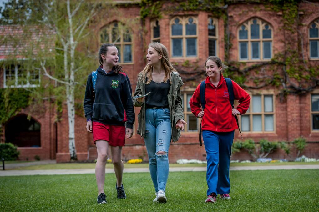 The first female students on Canberra Boys Grammar School campus in preparation for 2017. From left: Charlize King (year 7), Annabelle Lester (year 11), and Frida Meares (year 7). Photo: Karleen Minney