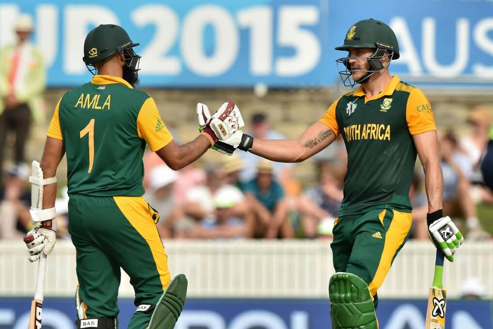South Africa's Faf du Plessis (R) and Hashim Amla (L) both reached centuries at Maunka Oval. Photo: Peter Parks