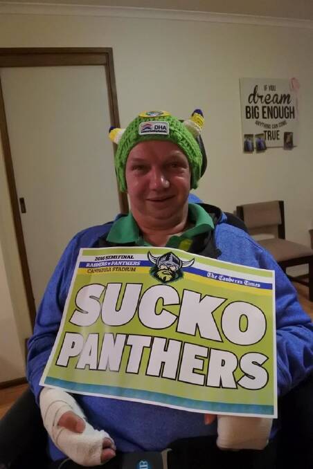 Brian Connell with the "Sucko Panthers'' poster printed for him by The Canberra Times. Photo: Supplied