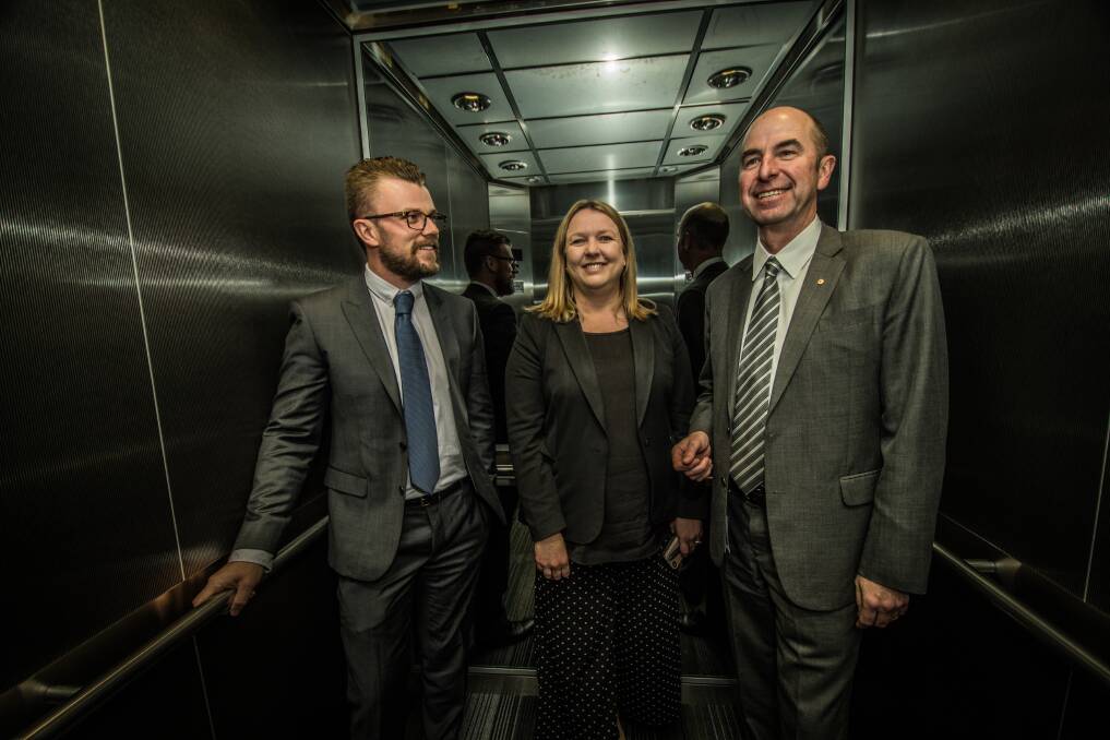 The Human Services Department is helping veterans into jobs after they leave the defence force, recruiting them to its cyber defence team protecting Australia's welfare system.  From left, new recruit James Line, chief information security officer Narelle Devine, and acting chief information officer Charles McHardie. Photo: Karleen Minney