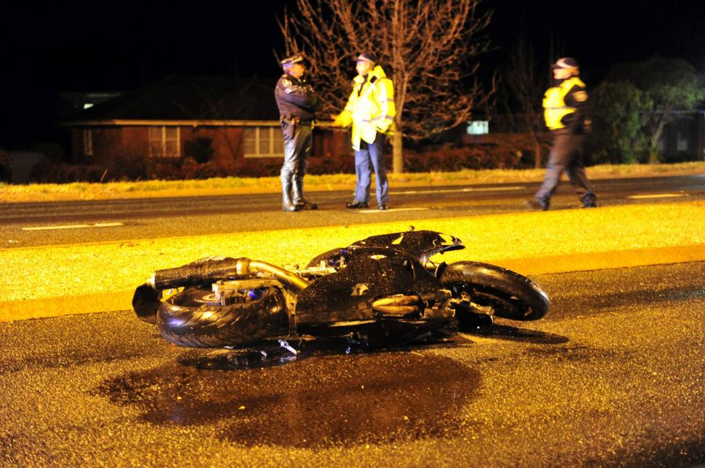 T Policing members attend the scene of a motorcycle accident on Sturt Avenue Narrabundah on Thursday night. Photo: Karleen Minney