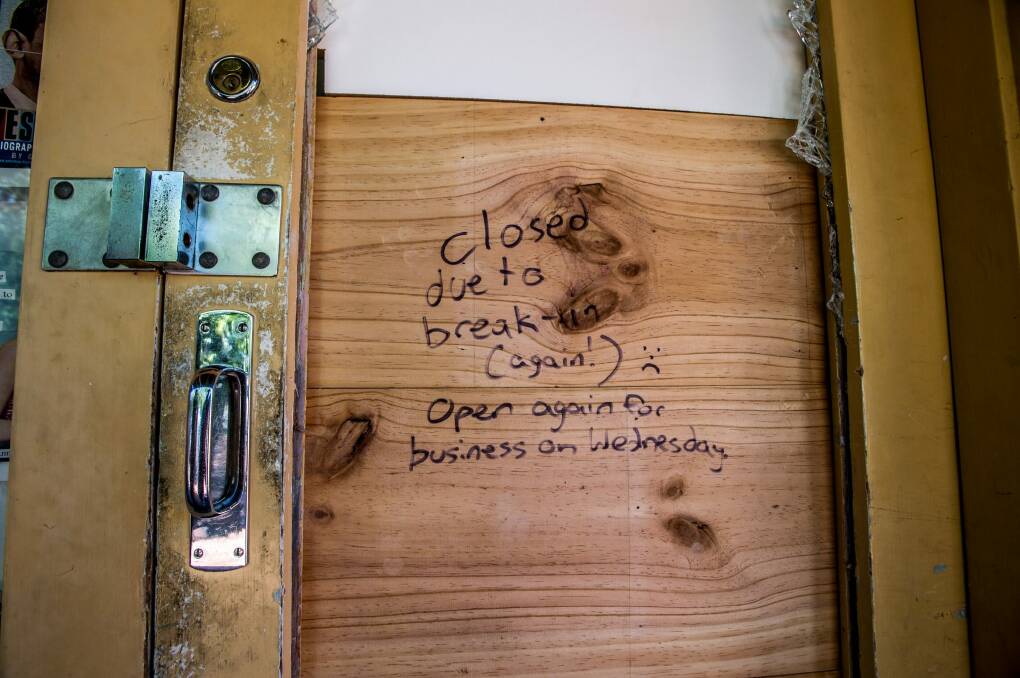 The Book Lore glass door had been smashed twice in three weeks. Photo: Karleen Minney