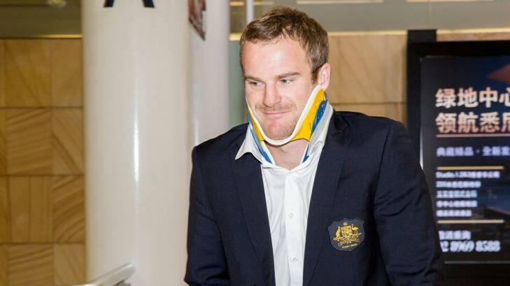Pat McCabe returns home with a neck brace on Sunday. Photo: Getty Images