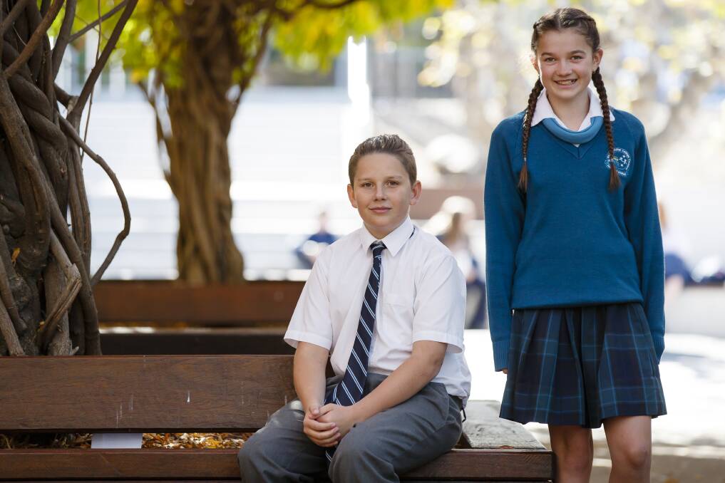 Year 7 St Mary McKillop College students Luca Hrstic and Katie Williams. Photo: Sitthixay Ditthavong