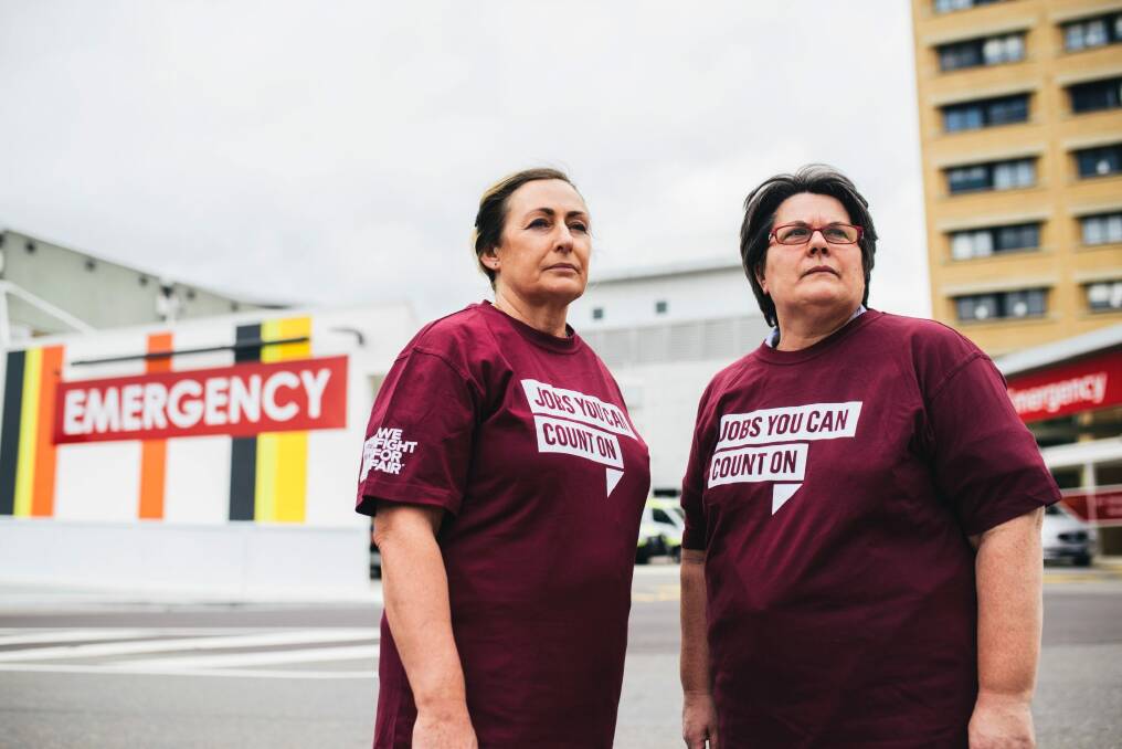 Canberra Hospital cleaners Lyn Martins and Helen Piggott who say they haven't received a real payrise in five years. Photo: Rohan Thomson