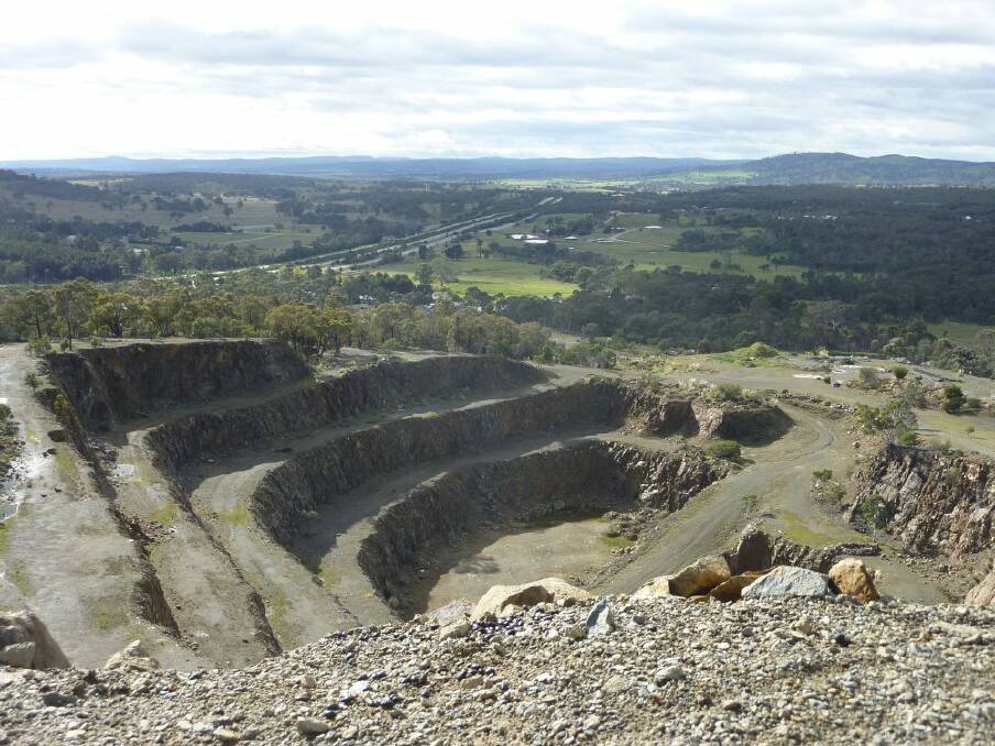 Panorama: A bird's-eye view from the location of the proposed sign over the old Eagle Hawk Hill quarry and beyond to the Federal Highway.