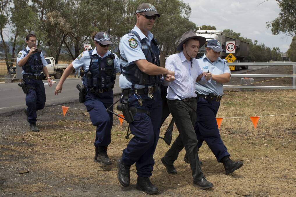 Civil disobedience: Professor Colin Butler was arrested at the Gunnedah coal-processing plant on Wednesday. Photo: Courtesy of Jeff Tan